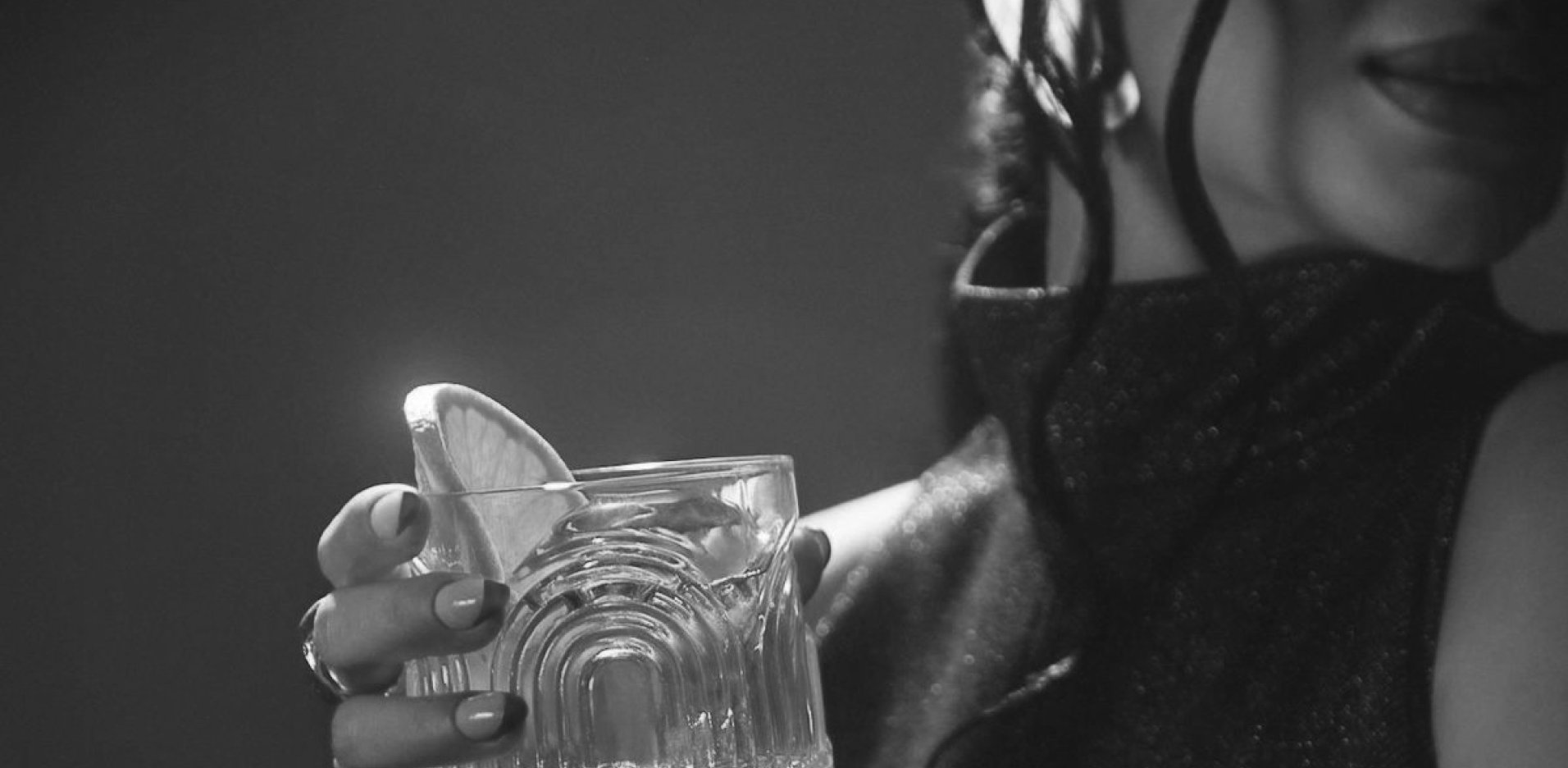 Guest enjoying a cocktail at a Thirst Bar Services event